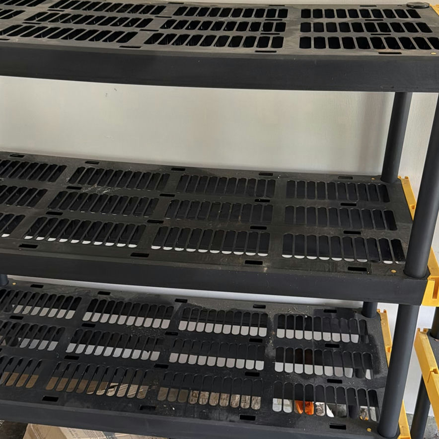 Black multi-tier shelving units with yellow corner brackets - image 3 of 5