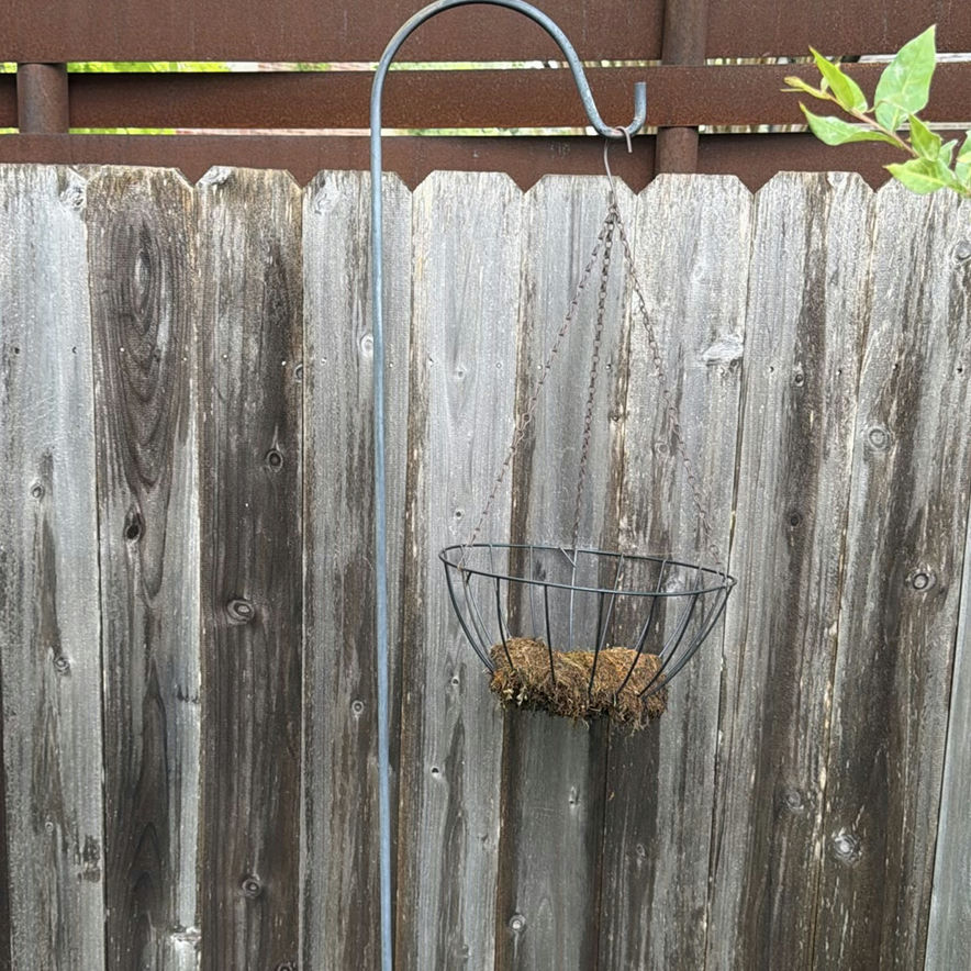 Rusty metal cowboy-hat humanoid garden sculpture with hanging basket - image 6 of 6