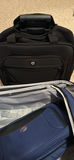 Blue Olympia rolling suitcase with black carry-on bag and iron - thumbnail 5 of 6