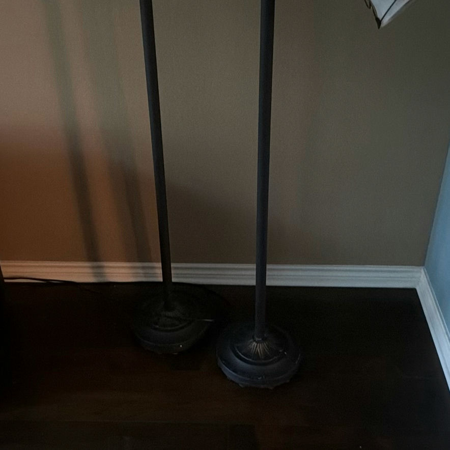 Pair of black floor lamps with dual light heads - image 5 of 6