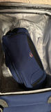 Blue Olympia rolling suitcase with black carry-on bag and iron - thumbnail 3 of 6