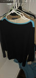 Assorted women's knit sweaters and tops on hangers - thumbnail 2 of 14