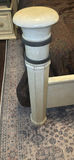 Cream four-poster bed with wrought-iron headboard and circular wall art - thumbnail 4 of 11