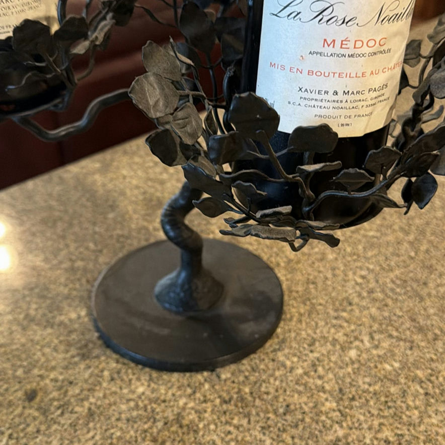 Two wine bottles in a metal leaf candelabra centerpiece - image 2 of 5
