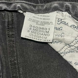 Assorted pants and jeans in a dresser drawer - thumbnail 6 of 6
