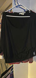 Assorted women's tops and blouses in closet - thumbnail 15 of 21