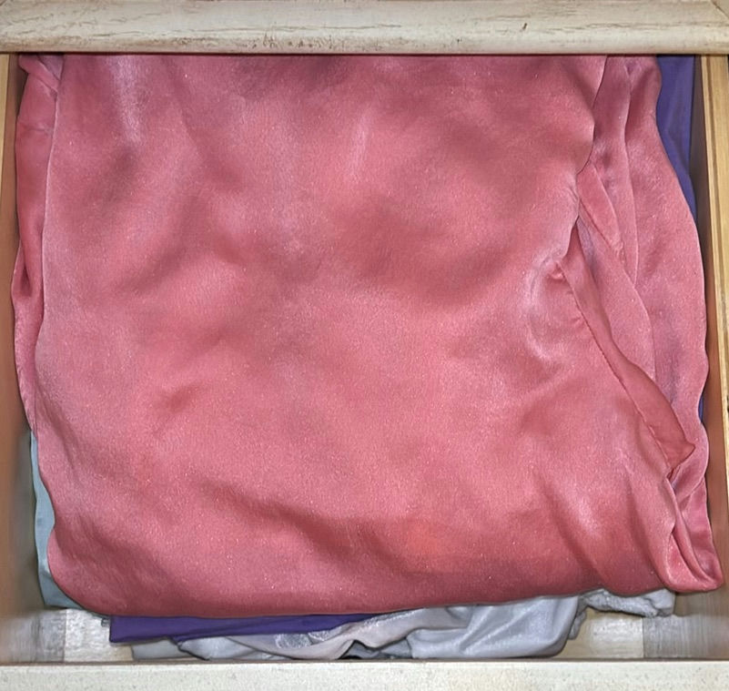 Assorted women's sleepwear and pastel fabrics - image 1 of 8