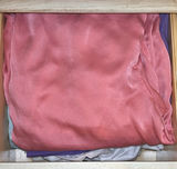 Assorted women's sleepwear and pastel fabrics - thumbnail 1 of 8