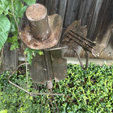Rusty metal cowboy-hat humanoid garden sculpture with hanging basket - thumbnail 2 of 6