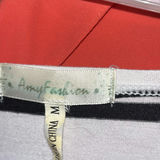 Assorted women's tops and blouses in closet - thumbnail 7 of 21