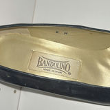 Black Bandolino pumps, pink leopard-patterned flip-flops, and black slingback sandals - thumbnail 2 of 13