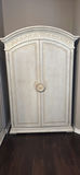 Ornate distressed white armoire with mirrored doors - thumbnail 1 of 8