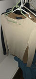 Assorted women's knit sweaters and tops on hangers - thumbnail 3 of 14