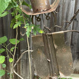 Rusty metal cowboy-hat humanoid garden sculpture with hanging basket - thumbnail 3 of 6