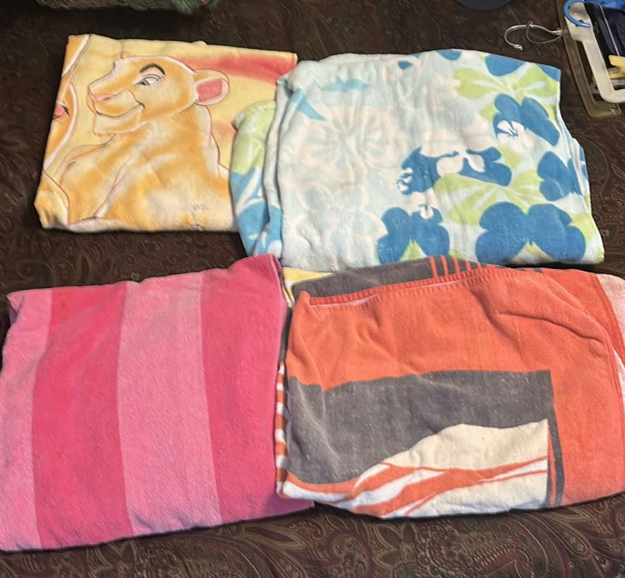 Assorted children's towels with varied prints - image 1 of 7