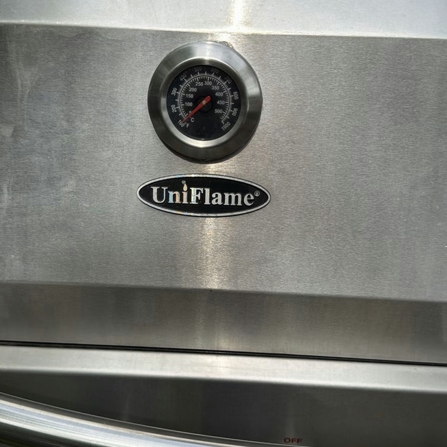 Stainless steel UniFlame gas grill with propane tank - image 2 of 8