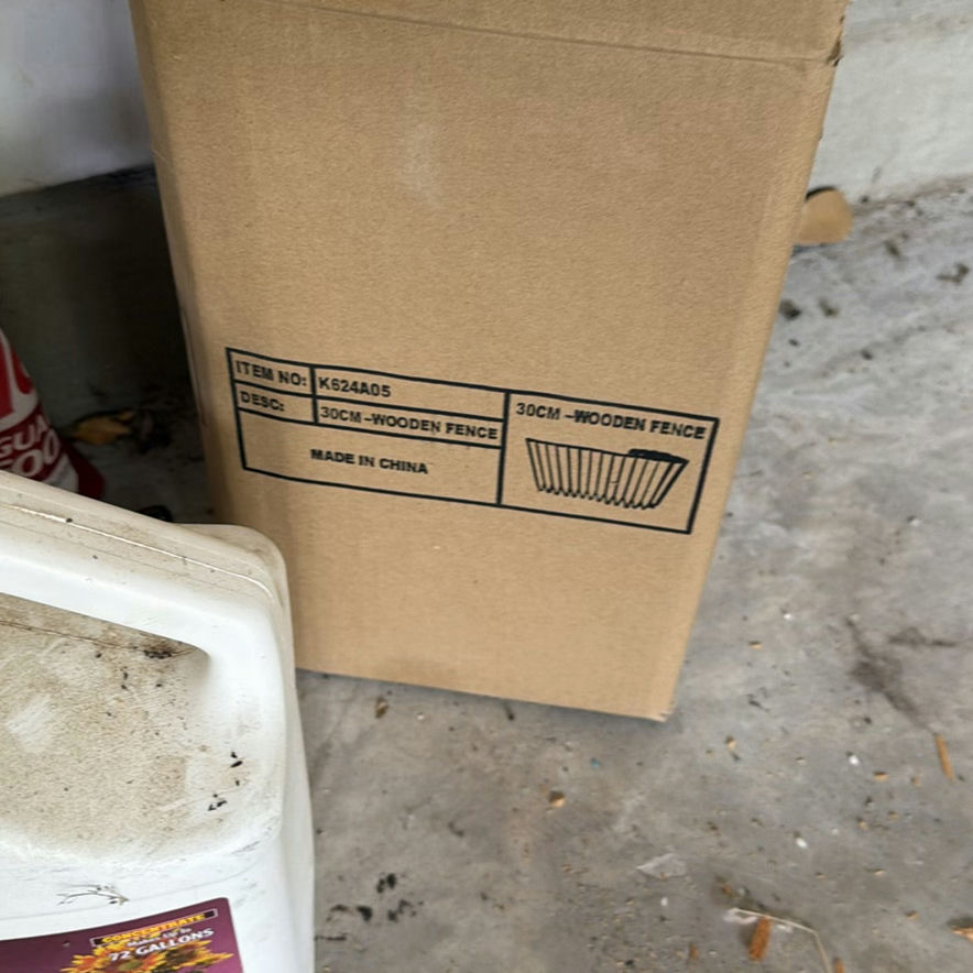 Gardening supplies and wooden fence components - image 5 of 6