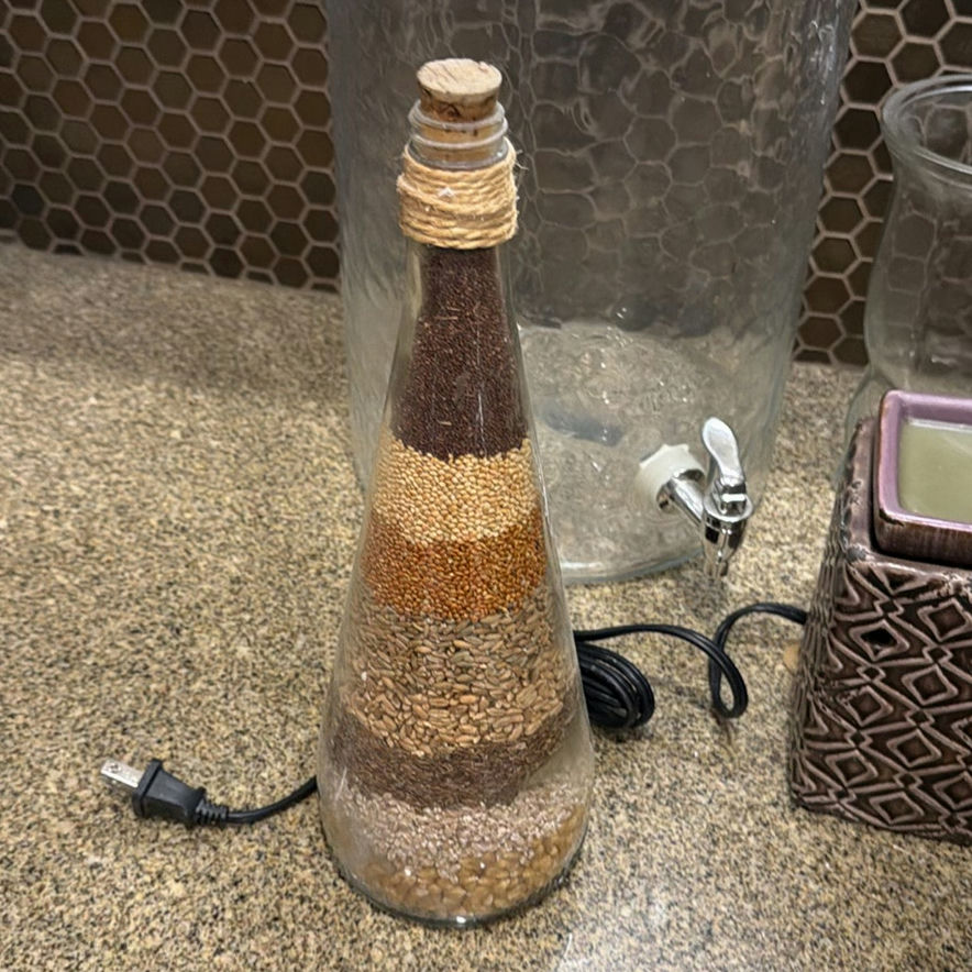 Glass dispenser, seed bottle, planter, baskets, plate, and jars - image 2 of 6