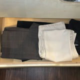 Assorted pants and jeans in a dresser drawer - thumbnail 2 of 6
