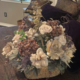 Decorative mirrors, butterfly wall art, and floral basket arrangement - thumbnail 5 of 6