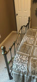 Ornate metal bed frame with quilted bedding - thumbnail 6 of 6