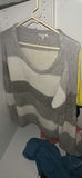 Assorted women's knit sweaters and tops on hangers - thumbnail 12 of 14