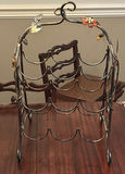 Artificial Floral Centerpiece, Decorative Branch Stems, and Metal Wine Rack - thumbnail 5 of 8