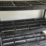 Black multi-tier shelving units with yellow corner brackets - thumbnail 5 of 5