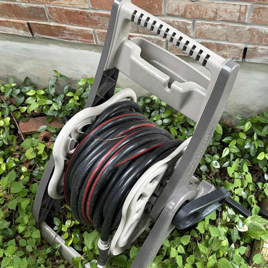 Wheeled garden hose reel with coiled hose - image 4 of 4