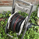 Wheeled garden hose reel with coiled hose - thumbnail 2 of 4