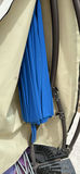 Patio umbrella with blue canopy and beige protective cover - thumbnail 2 of 6