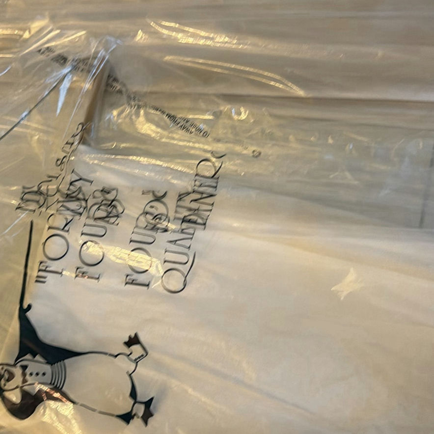White garment bags with penguin illustration - image 4 of 5
