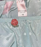 Assorted women's sleepwear and pastel fabrics - thumbnail 6 of 8