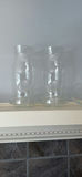 Assorted Clear Glass Hurricane Candle Holders, Pitcher, and Stemware - thumbnail 2 of 3