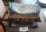 Decorative Baskets, Wooden Tray, and Assorted Fabric Placemats - thumbnail 1 of 5
