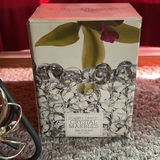 Assorted Home Decor Items Including Baskets, Candle Holders, and Crystal Marbles - thumbnail 4 of 8