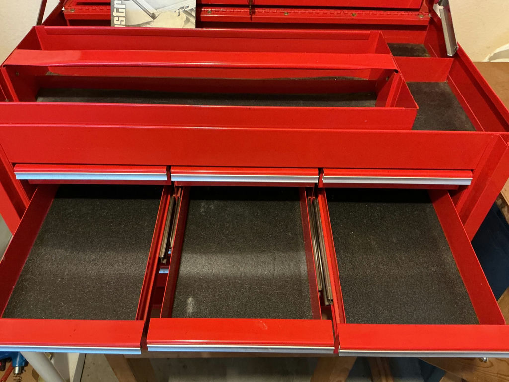 Snap-on red tool chest with drawers and assorted hand tools - image 4 of 10
