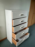 White wooden five-drawer dresser. - thumbnail 2 of 4