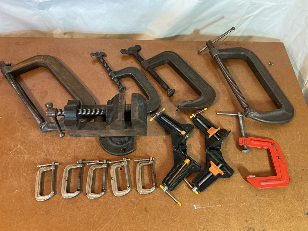 Assorted vintage woodworking clamps and bench vise - image 1 of 7