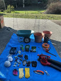 Gardening tools and equipment with wheelbarrow and pots - thumbnail 1 of 8