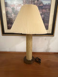 mid-century modern style table lamp featuring a textured, woven base - thumbnail 1 of 3