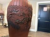 Terracotta vase with dragon relief on wooden stand - thumbnail 9 of 9