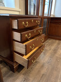 Dark wood five-drawer dresser with brass hardware - thumbnail 2 of 7
