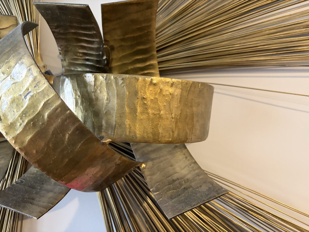 Gold-toned metal sunburst wall sculpture - image 4 of 5