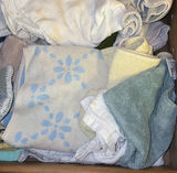 Assorted Towels and Linens in a Drawer - thumbnail 2 of 4