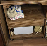 Wooden cabinet with open shelf, drawer, and electronics - thumbnail 1 of 4