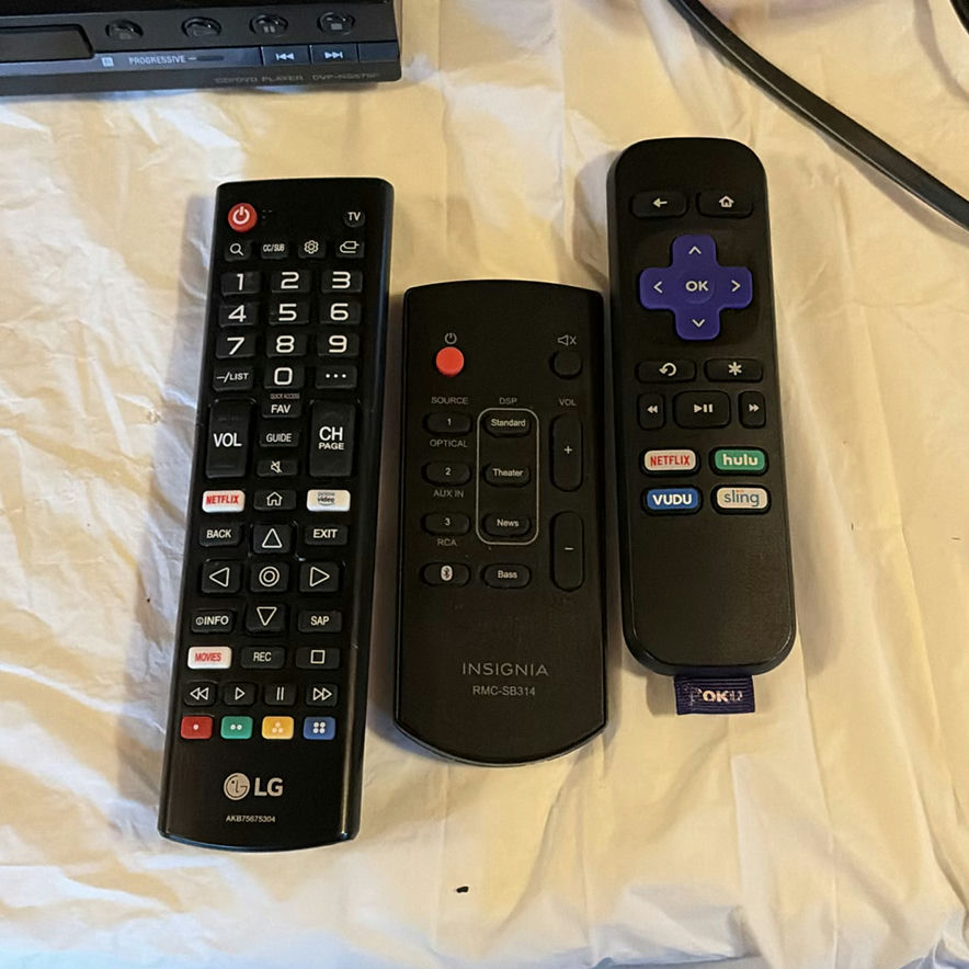 Sony DVD player with remotes and mixed DVD collection - image 2 of 6