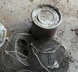 Assorted round wire mesh traps and a landing net - thumbnail 3 of 4