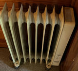 DeLonghi The Incredible Heat Machine oil-filled radiator space heater - thumbnail 1 of 5