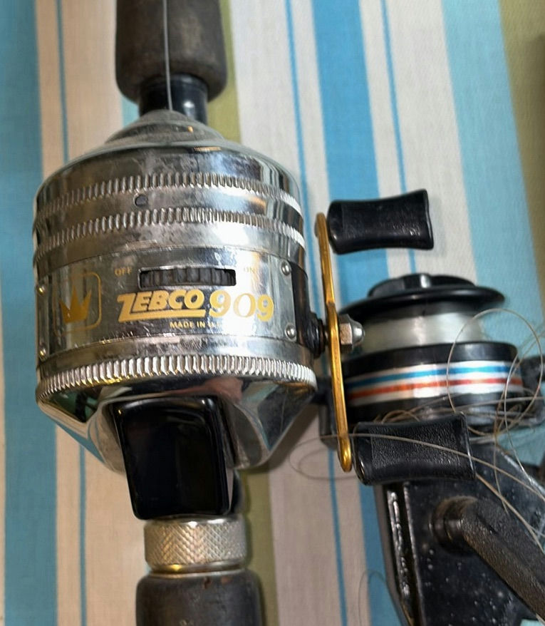Four fishing rods with reels - image 4 of 6
